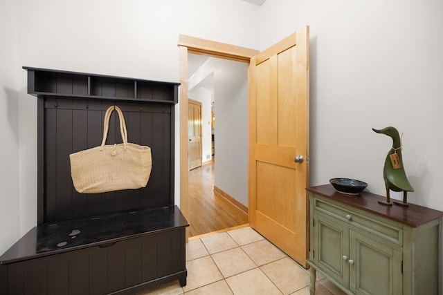 11050 Sweetwater Path, Woodbury, MN 55129 - mudroom featuring light tile patterned floors