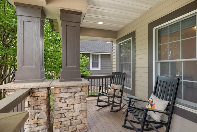11050 Sweetwater Path, Woodbury, MN 55129 - wooden deck featuring a porch