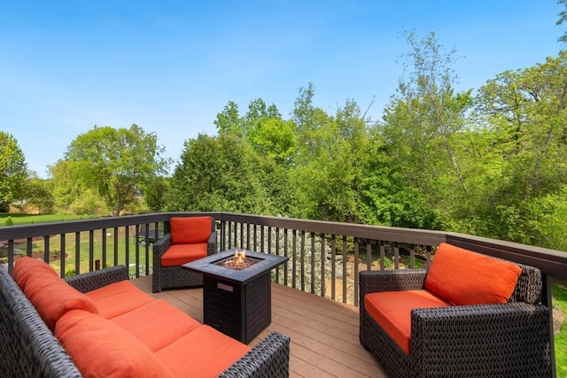 11050 Sweetwater Path, Woodbury, MN 55129 - wooden terrace with an outdoor fire pit