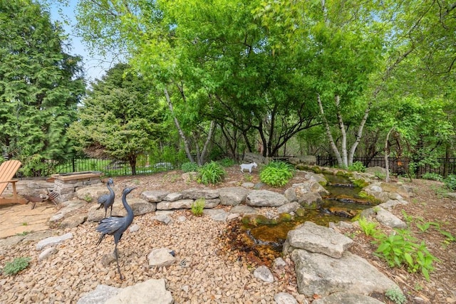 11050 Sweetwater Path, Woodbury, MN 55129 - view of yard featuring fence