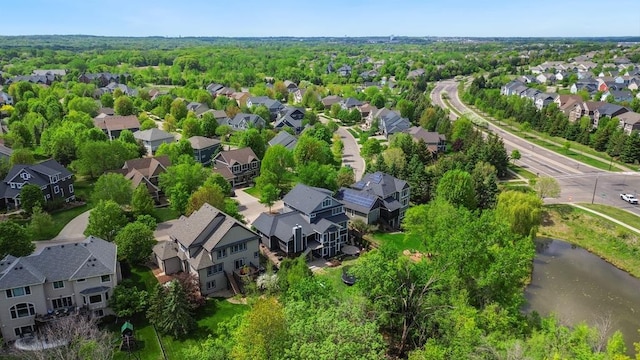 11050 Sweetwater Path, Woodbury, MN 55129 - aerial perspective of suburban area with a large body of water
