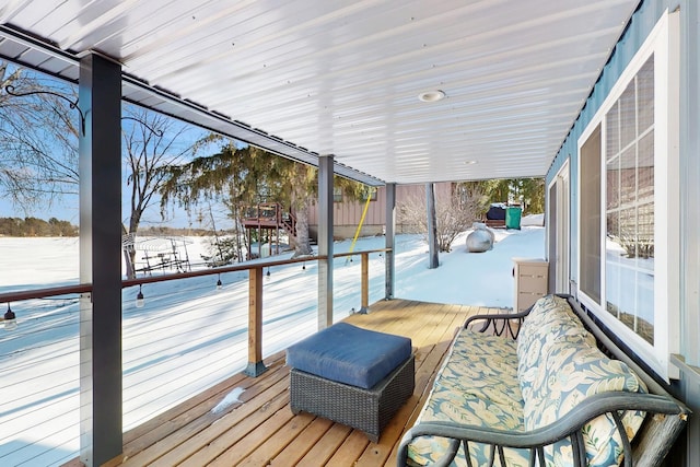 view of snow covered deck