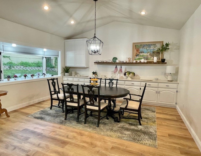 dining area with light wood-style floors, lofted ceiling, baseboards, and recessed lighting