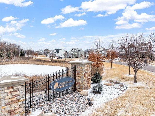 exterior space with a residential view and fence