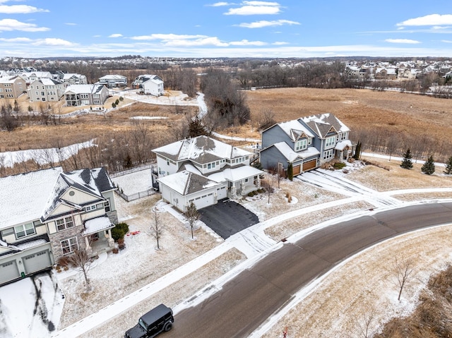 birds eye view of property with a residential view