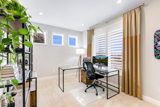 carpeted office space featuring recessed lighting and baseboards