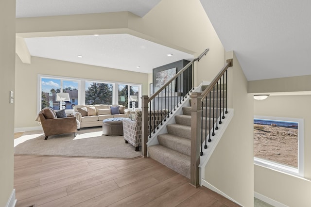 2080 151st Ave NW, Andover, MN 55304 - living area featuring wood finished floors, baseboards, stairs, and recessed lighting