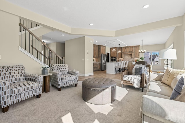 2080 151st Ave NW, Andover, MN 55304 - living area featuring recessed lighting, a chandelier, stairs, baseboards, and light carpet