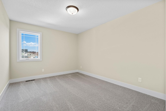 2080 151st Ave NW, Andover, MN 55304 - carpeted spare room featuring a textured ceiling and baseboards