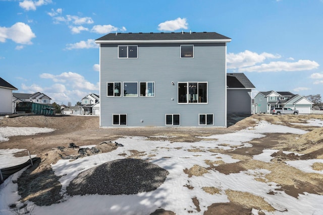 2080 151st Ave NW, Andover, MN 55304 - snow covered rear of property featuring a residential view