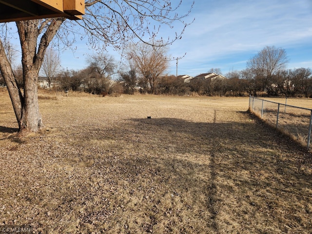 view of yard featuring fence