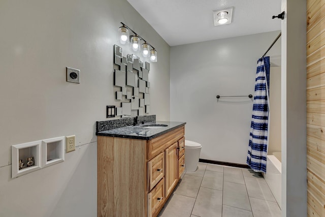 bathroom featuring shower / tub combo, baseboards, toilet, tile patterned flooring, and vanity