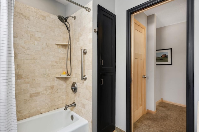 full bathroom featuring shower / bath combination and baseboards