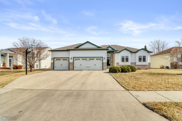 ranch-style home with concrete driveway, an attached garage, brick siding, and a front yard