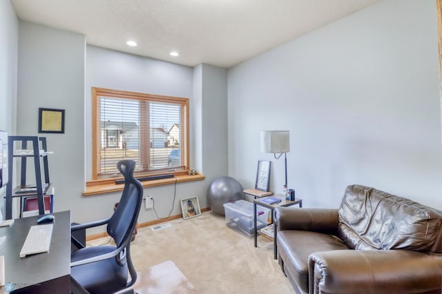 office space featuring recessed lighting, visible vents, baseboards, and carpet