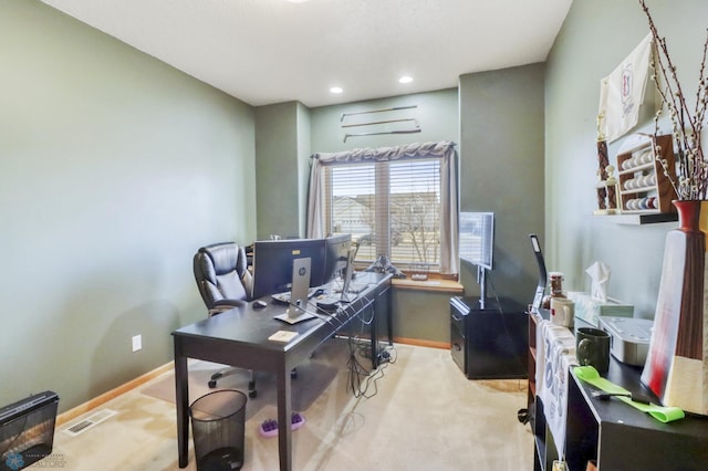 office space with recessed lighting, visible vents, and baseboards