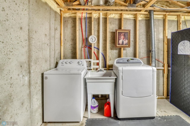 unfinished basement featuring washer and clothes dryer