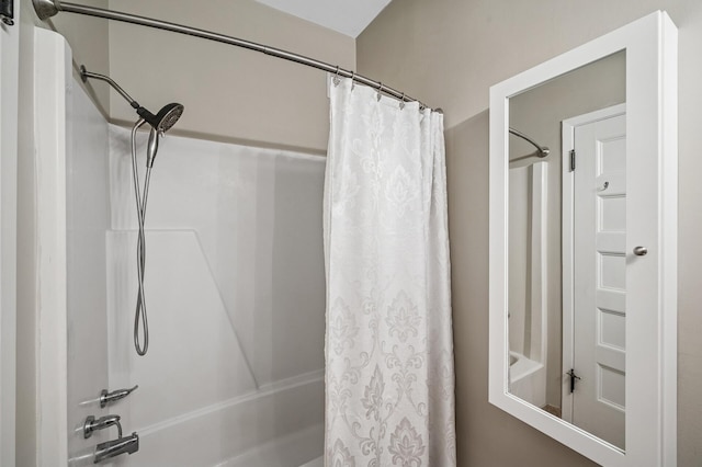 full bathroom with shower / bath combo with shower curtain