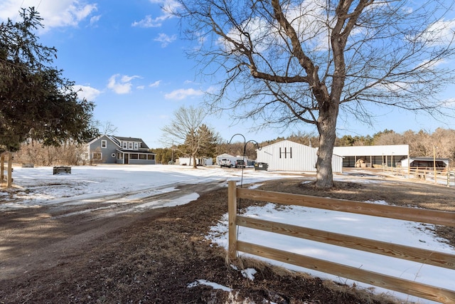 view of yard covered in snow