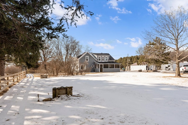 exterior space featuring a sunroom