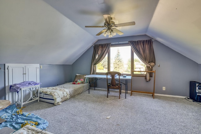 bedroom featuring carpet floors, ceiling fan, baseboards, and vaulted ceiling