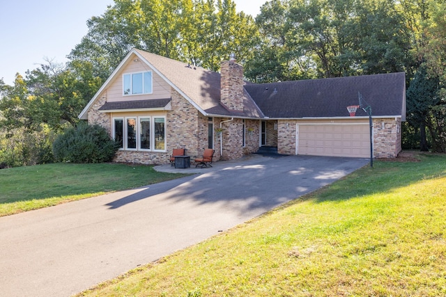71 Deer Hills Ct, North Oaks, MN 55127 - view of front of house with driveway, a garage, a front lawn, a chimney, and brick siding