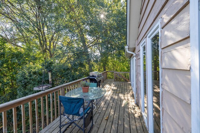 71 Deer Hills Ct, North Oaks, MN 55127 - wooden deck featuring outdoor dining area and area for grilling