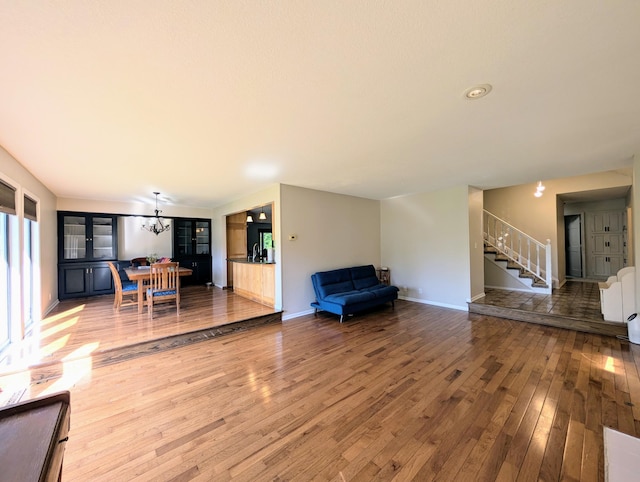 71 Deer Hills Ct, North Oaks, MN 55127 - living room with wood-type flooring, stairway, baseboards, and recessed lighting