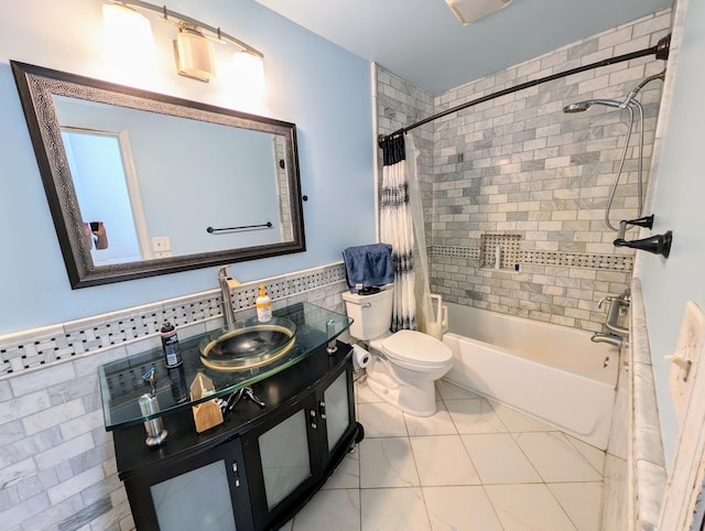 71 Deer Hills Ct, North Oaks, MN 55127 - bathroom featuring tile walls, toilet, shower / tub combo with curtain, vanity, and tile patterned floors