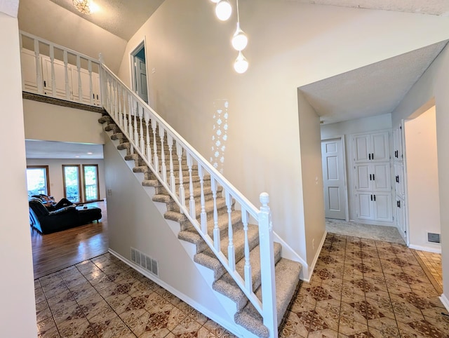 71 Deer Hills Ct, North Oaks, MN 55127 - staircase featuring baseboards