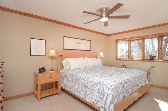 bedroom featuring light carpet, baseboards, and ornamental molding