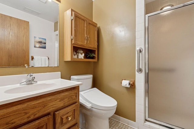 full bathroom with toilet, a stall shower, tile patterned flooring, baseboards, and vanity