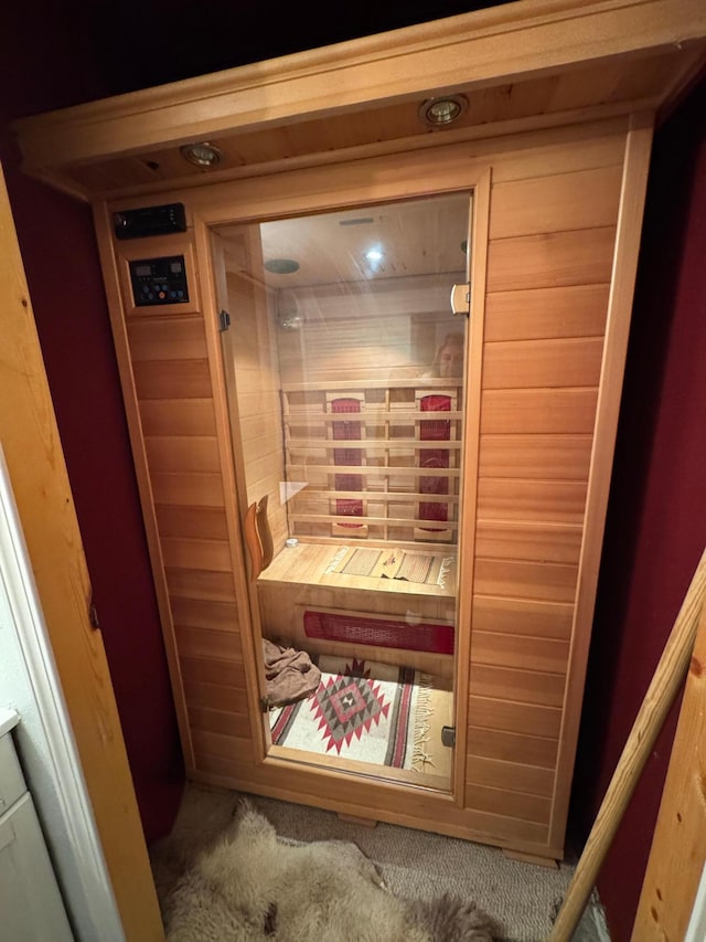 view of sauna / steam room featuring carpet floors