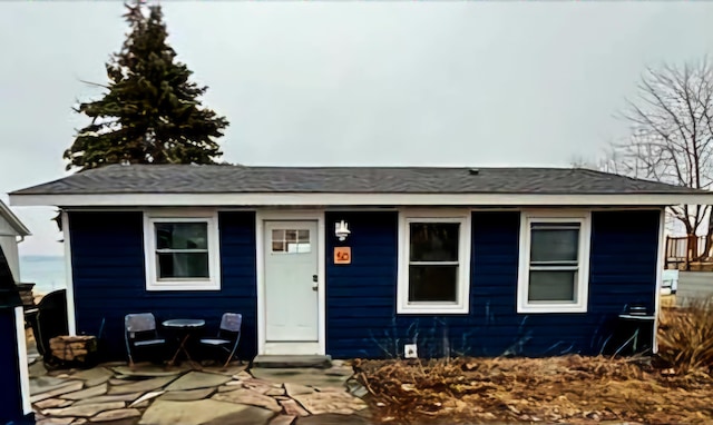 view of front facade with a patio area