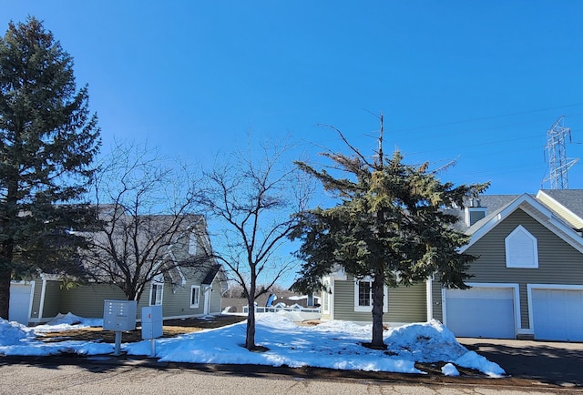 exterior space featuring a garage and driveway