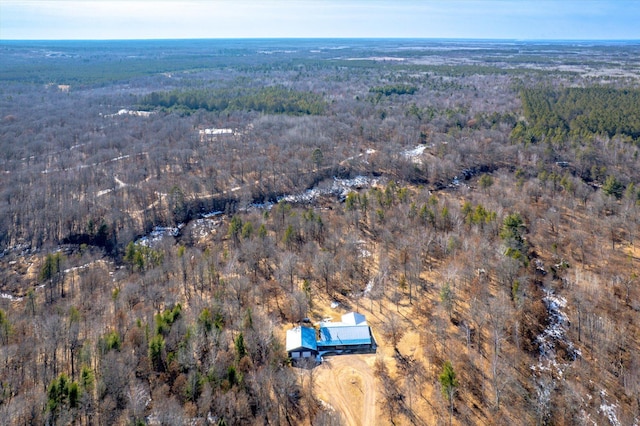 bird's eye view featuring a view of trees