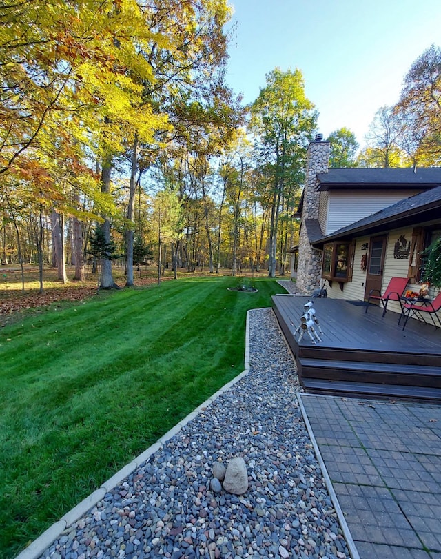 view of yard featuring a deck