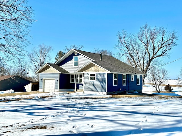 view of front of home featuring an attached garage