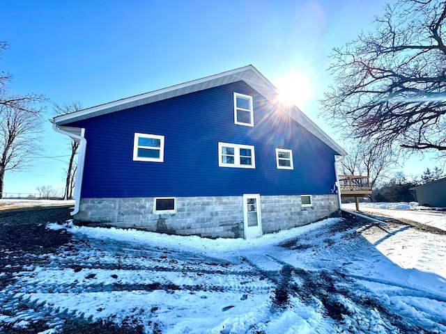 view of snow covered property