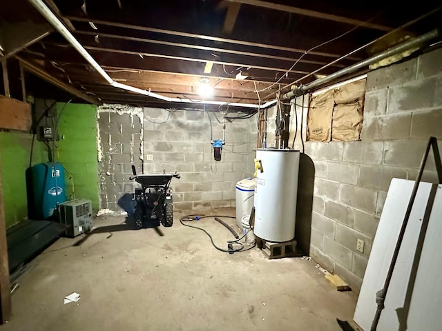 unfinished basement featuring water heater