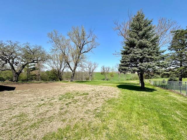 view of yard with fence