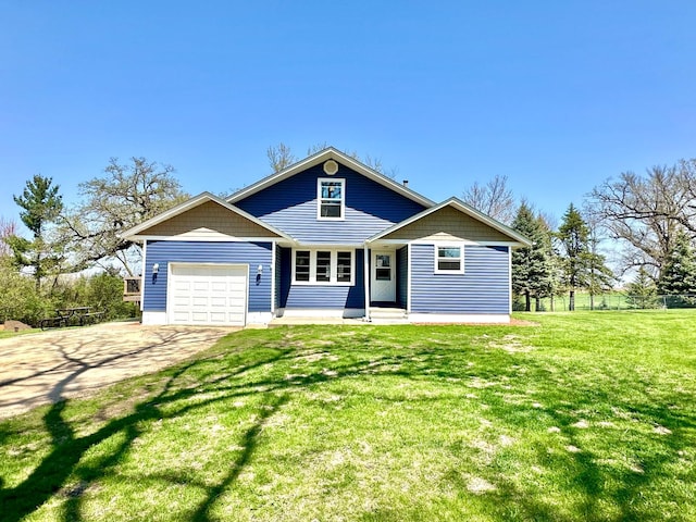 view of front of property with concrete driveway, an attached garage, fence, and a front lawn