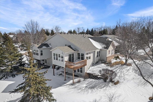 view of snow covered property