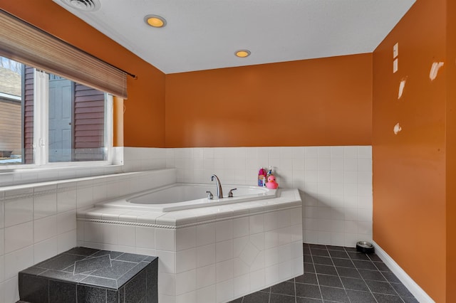 full bathroom with visible vents, a garden tub, recessed lighting, tile patterned flooring, and baseboards