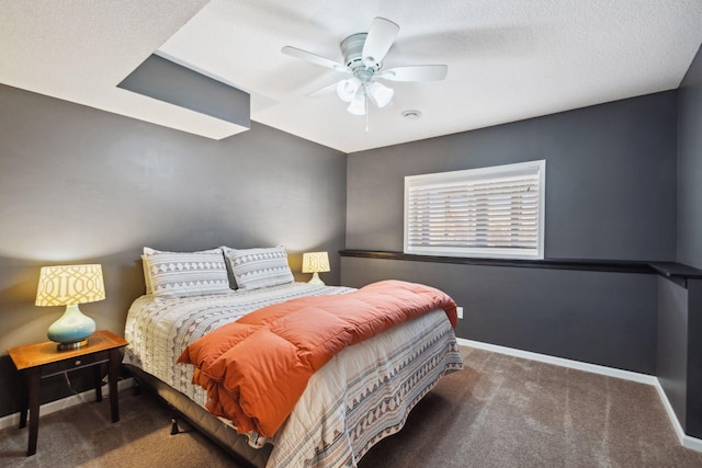 carpeted bedroom featuring ceiling fan and baseboards