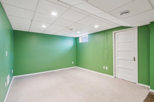 basement featuring recessed lighting, baseboards, and carpet flooring