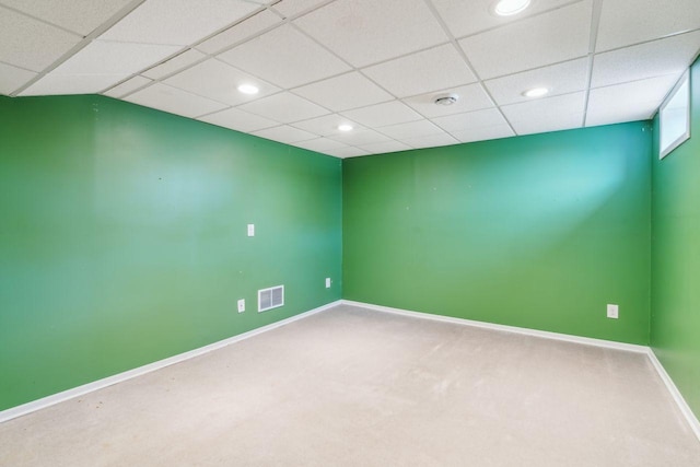 carpeted spare room with recessed lighting, visible vents, baseboards, and a paneled ceiling