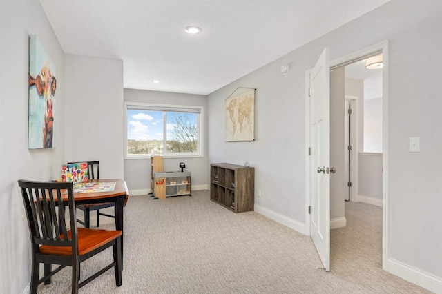 interior space featuring carpet floors, baseboards, and recessed lighting