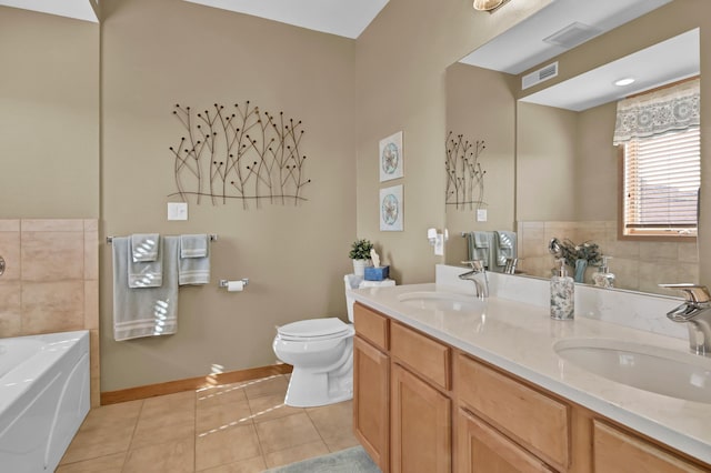 full bath with tile patterned floors, visible vents, toilet, and a sink