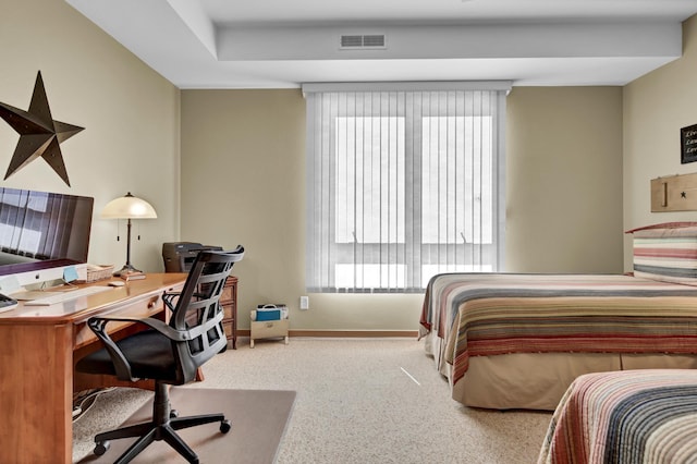 bedroom featuring baseboards, visible vents, and carpet floors